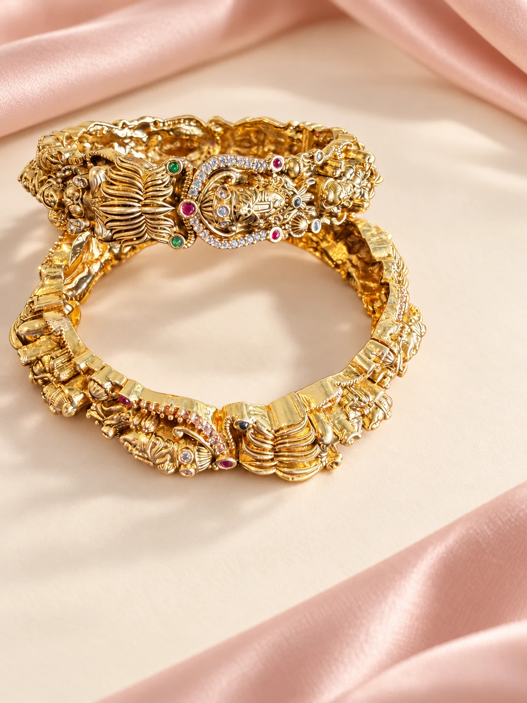 Temple Motif Gold-Tone Bangles — main view on an ivory and blush background